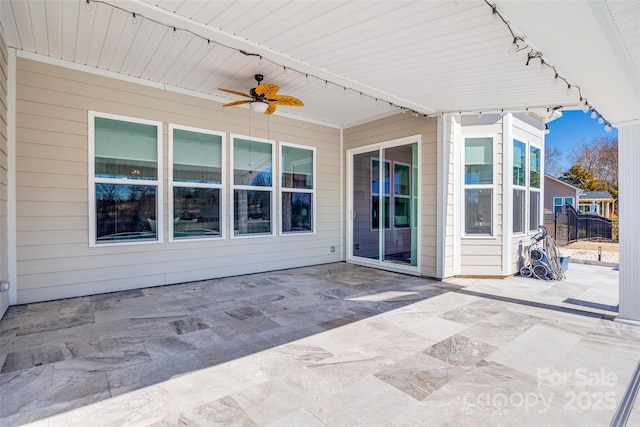 view of patio with ceiling fan