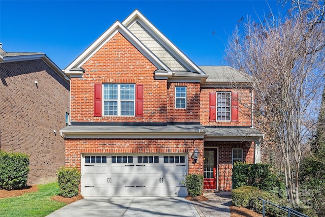 view of front of property with a garage