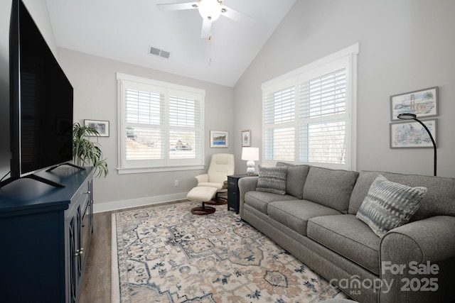 living room featuring ceiling fan, dark hardwood / wood-style floors, and lofted ceiling