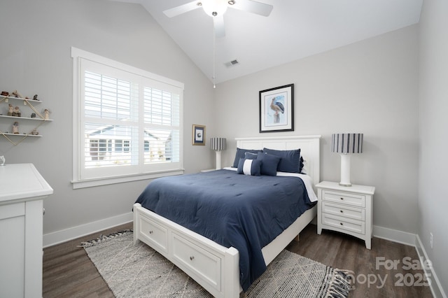 bedroom featuring ceiling fan, vaulted ceiling, and dark hardwood / wood-style flooring