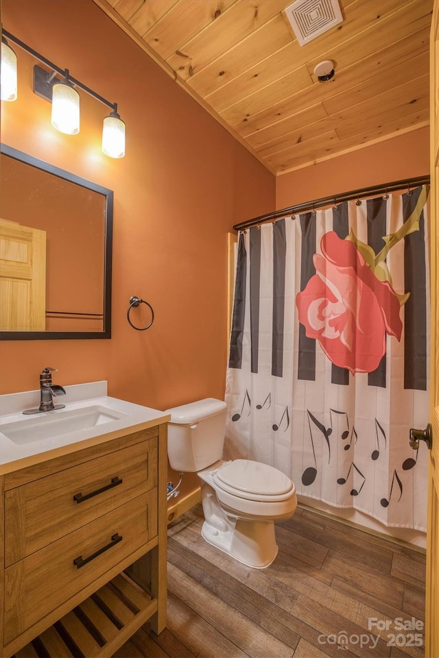 bathroom with vanity, wood-type flooring, wooden ceiling, and toilet