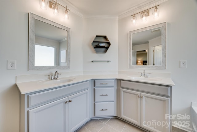 full bath featuring double vanity, crown molding, a sink, and tile patterned floors