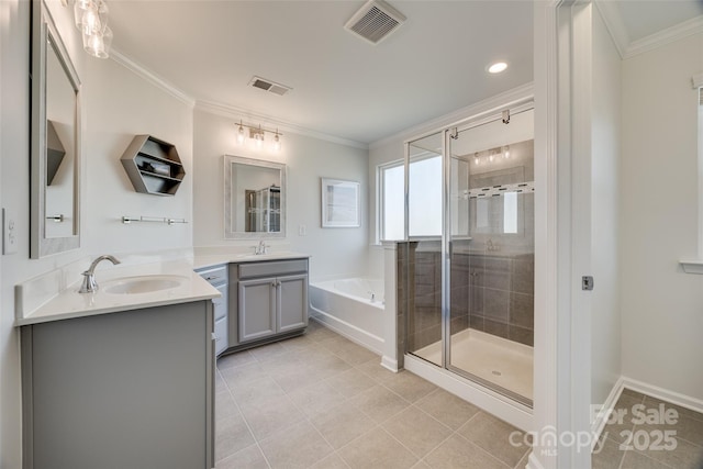 full bath with a bath, a shower stall, visible vents, and crown molding