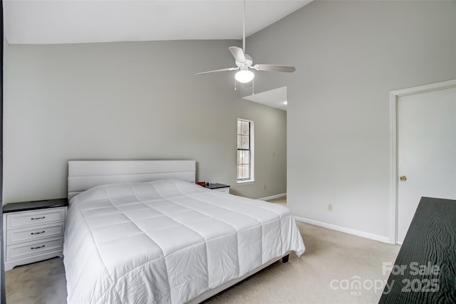 carpeted bedroom with ceiling fan, high vaulted ceiling, and baseboards