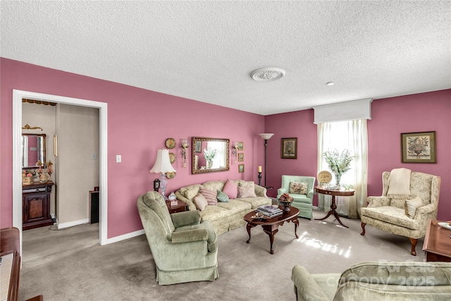 living area with a textured ceiling, carpet flooring, and baseboards