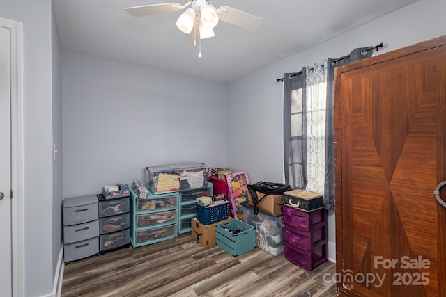 interior space featuring a ceiling fan