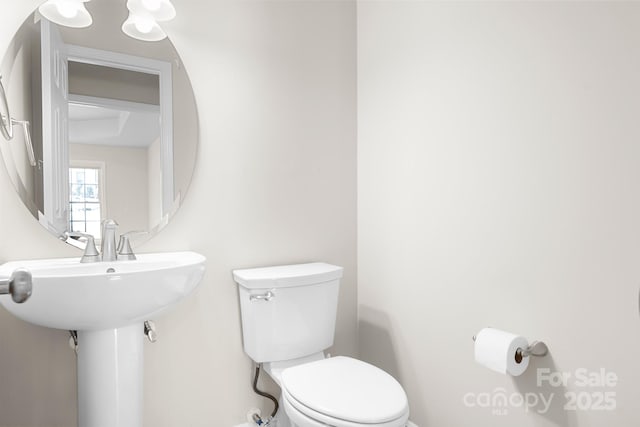 126 Emerald Dr, Mooresville, NC 28117 - bathroom with toilet and baseboards