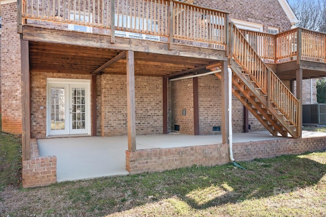 126 Emerald Dr, Mooresville, NC 28117 - back of house featuring stairway, a patio, brick siding, french doors, and a deck