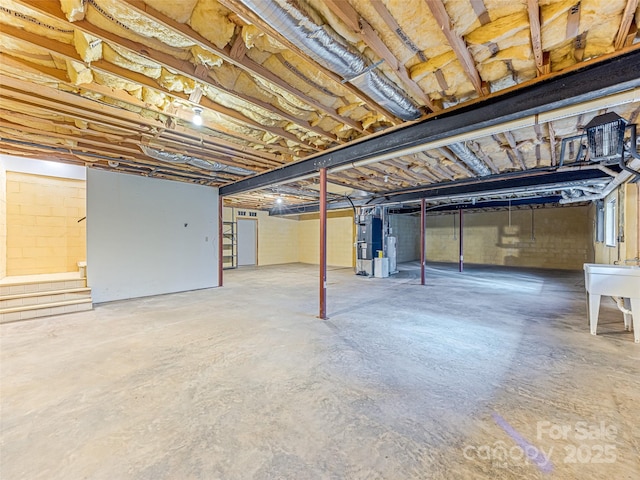 basement featuring heating unit