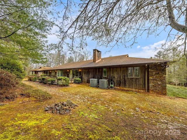 back of property with cooling unit