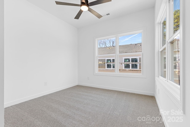 unfurnished room featuring carpet flooring and ceiling fan