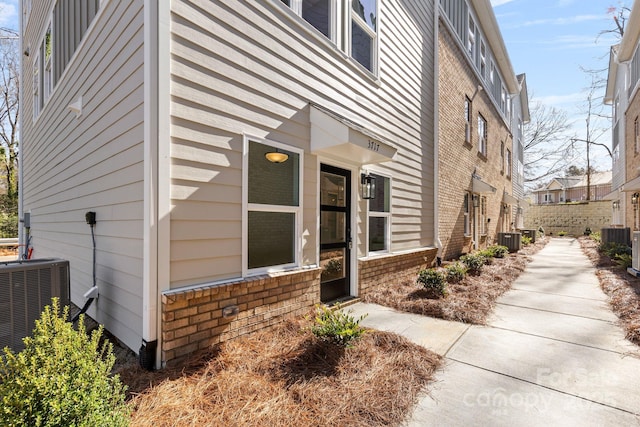 view of property exterior featuring central AC unit