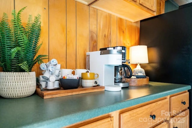 kitchen featuring freestanding refrigerator