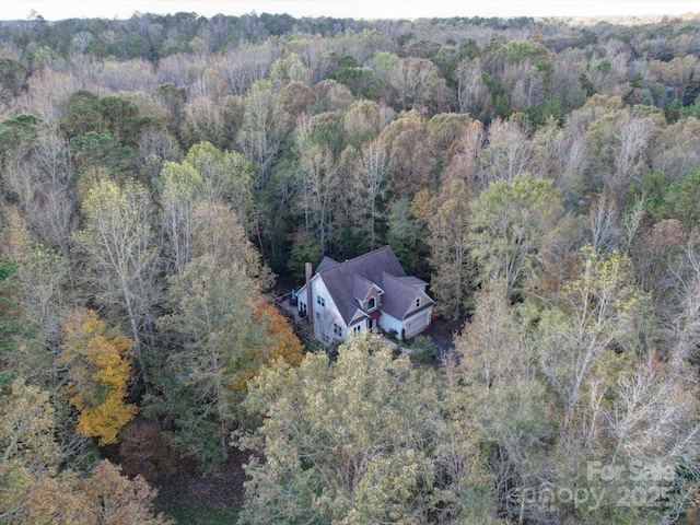 aerial view with a wooded view