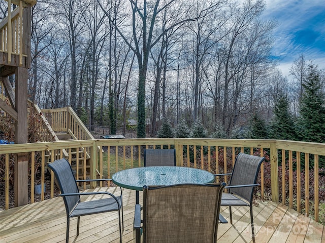 deck featuring outdoor dining area