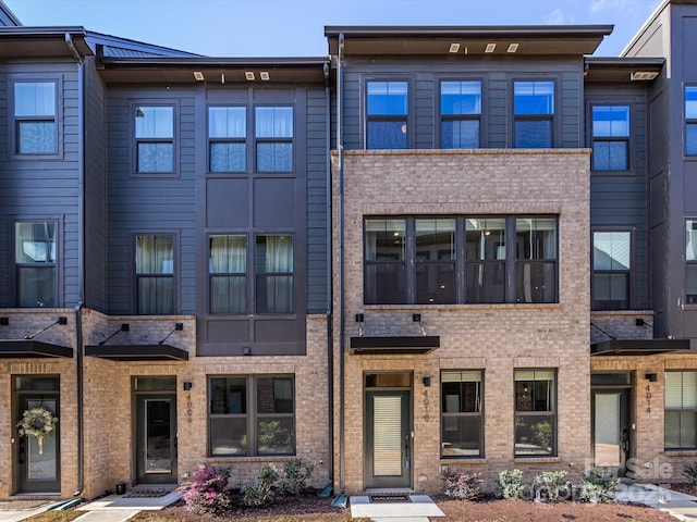 4010 Citra Ln, Charlotte, NC 28217 - townhome / multi-family property featuring brick siding