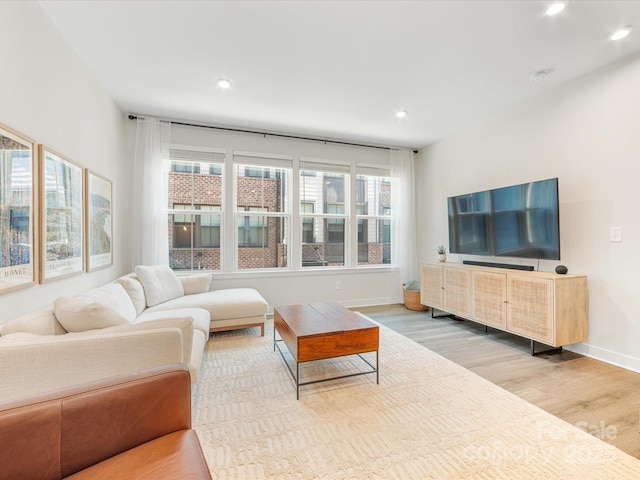 4010 Citra Ln, Charlotte, NC 28217 - living area featuring wood finished floors, recessed lighting, and baseboards