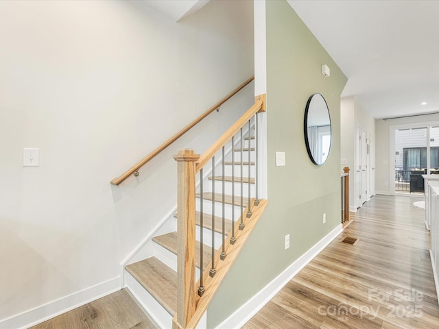 4010 Citra Ln, Charlotte, NC 28217 - stairs featuring wood finished floors and baseboards