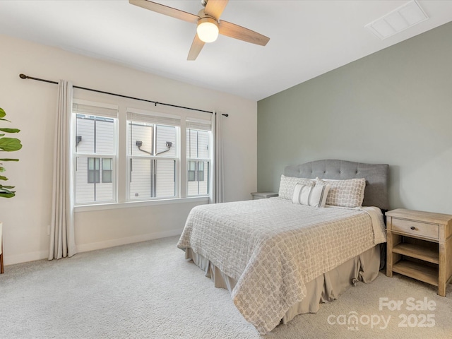 4010 Citra Ln, Charlotte, NC 28217 - bedroom with baseboards, carpet, and a ceiling fan