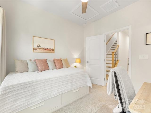 4010 Citra Ln, Charlotte, NC 28217 - bedroom with light colored carpet, attic access, and ceiling fan