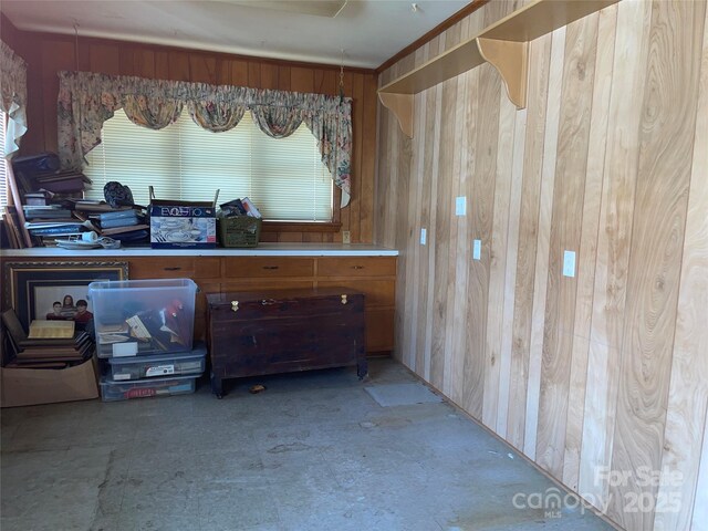 interior space featuring wood walls