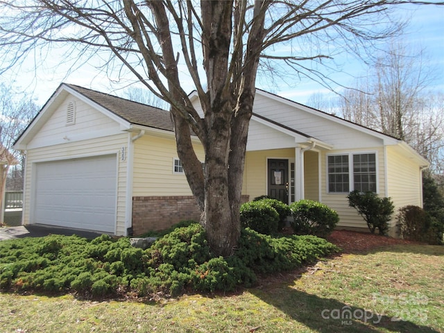 single story home featuring a garage