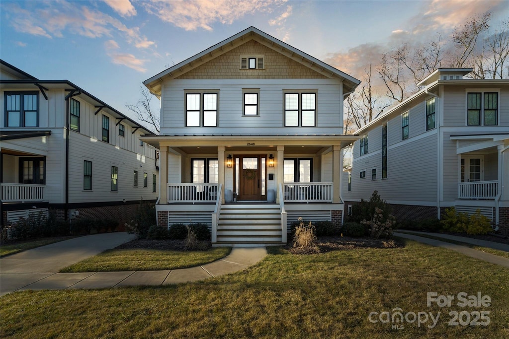 2648 Chesterfield Ave, Charlotte, NC 28205 - traditional style home featuring covered porch and a front yard