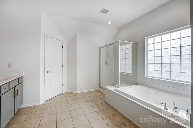 bathroom with a garden tub, tile patterned flooring, visible vents, and a shower stall