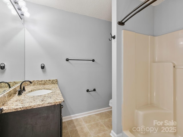 2302 Deermouse Way, Hendersonville, NC 28792 - full bathroom with toilet, a textured ceiling, tile patterned flooring, baseboards, and walk in shower