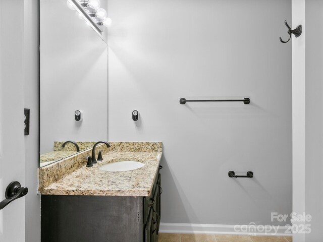 2302 Deermouse Way, Hendersonville, NC 28792 - bathroom featuring tile patterned flooring, vanity, and baseboards