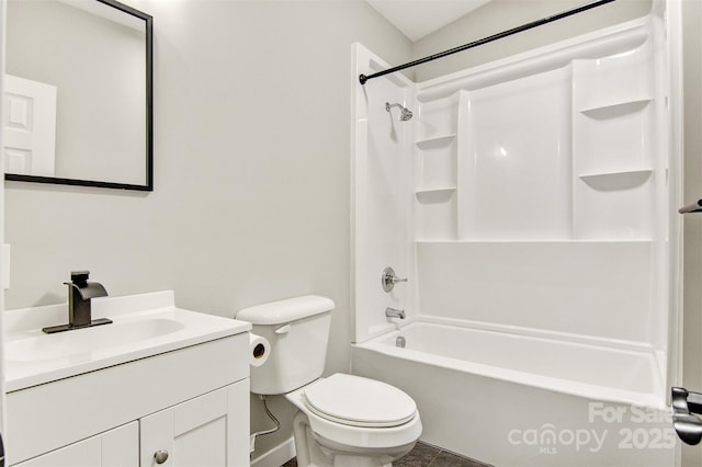 bathroom featuring toilet, shower / bath combination, and vanity