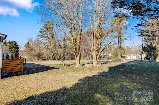 view of yard with a deck