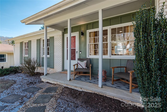 doorway to property with a porch