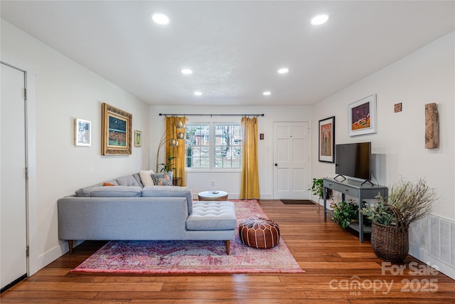 living room with hardwood / wood-style floors