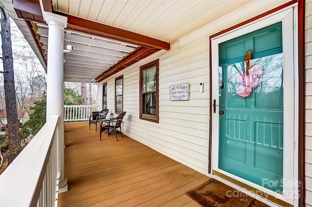 property entrance with a porch