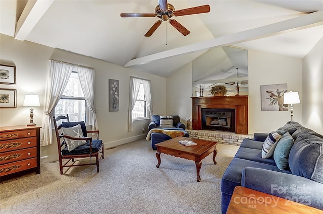 living area with carpet floors, lofted ceiling, and a fireplace