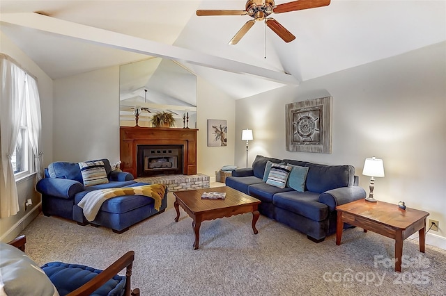 carpeted living room with baseboards, a ceiling fan, a fireplace, and vaulted ceiling