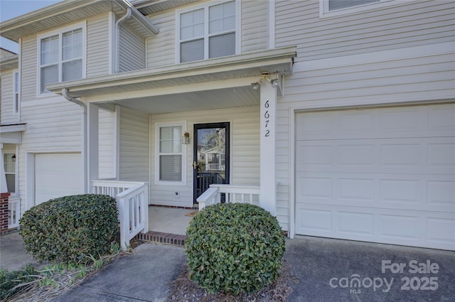 doorway to property featuring a porch