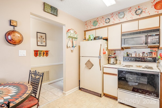 kitchen with a textured ceiling, backsplash, white appliances, and white cabinets