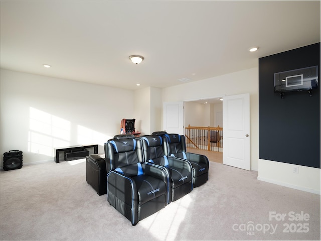 carpeted cinema with baseboards, visible vents, and recessed lighting