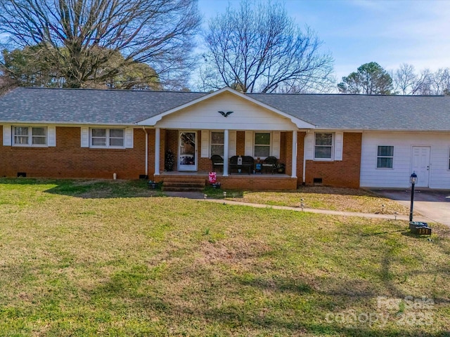 single story home featuring covered porch and a front lawn