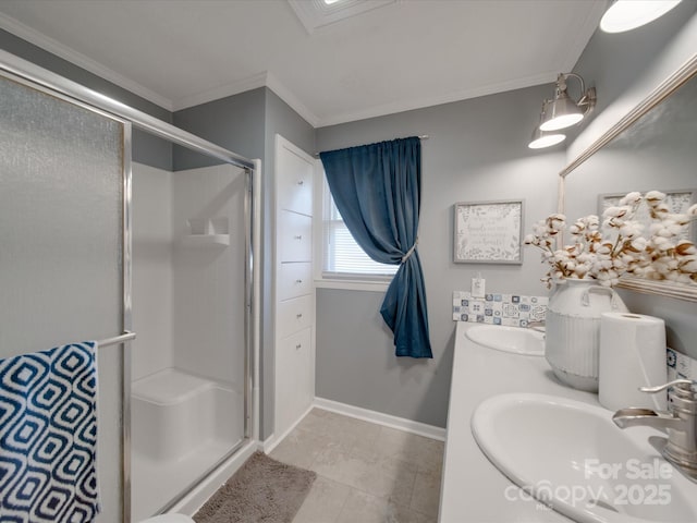 bathroom featuring a shower with shower door, ornamental molding, and vanity