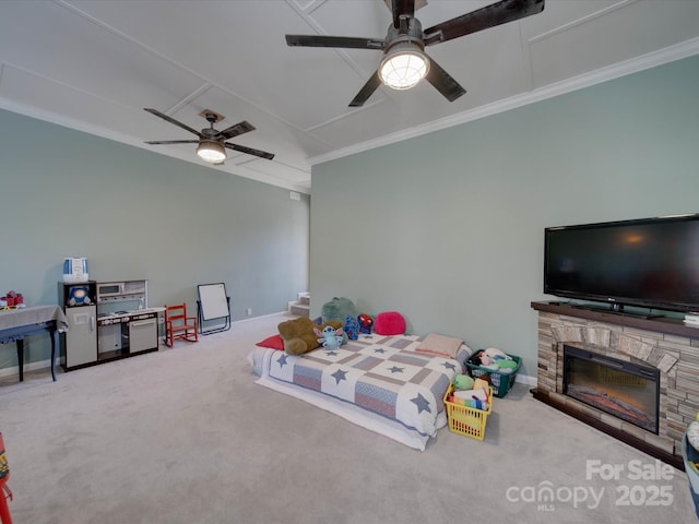 game room with ornamental molding, a stone fireplace, carpet, and vaulted ceiling