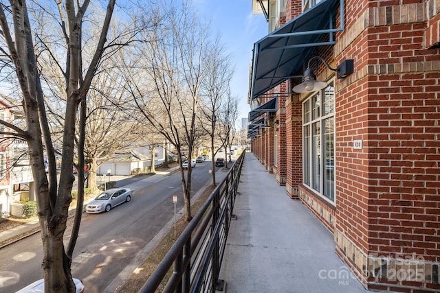 view of road featuring curbs and sidewalks