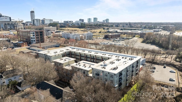 birds eye view of property with a city view