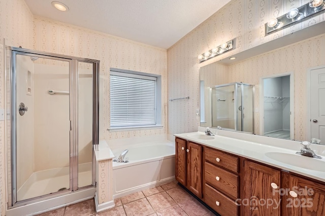 127 Lakewood Circle Dr, Mooresville, NC 28117 - bathroom featuring a sink, a shower stall, and wallpapered walls