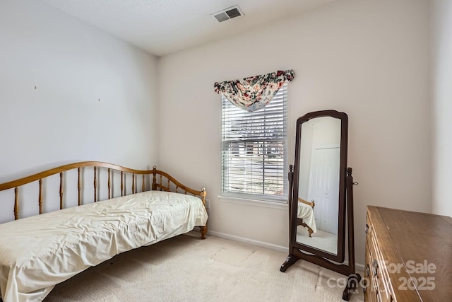 127 Lakewood Circle Dr, Mooresville, NC 28117 - bedroom with light colored carpet, visible vents, and baseboards