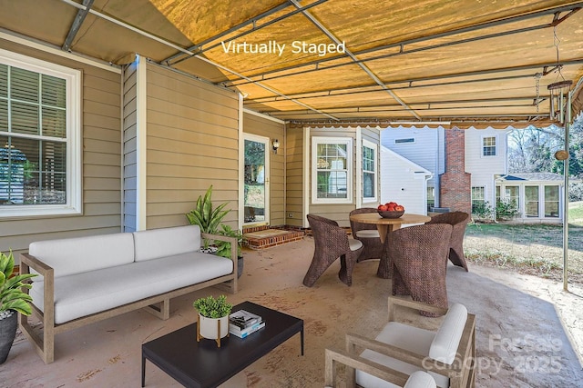 127 Lakewood Circle Dr, Mooresville, NC 28117 - view of patio featuring outdoor dining area and an outdoor living space