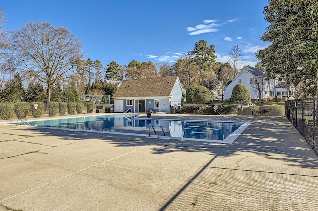 127 Lakewood Circle Dr, Mooresville, NC 28117 - community pool with a patio area, fence, and an outdoor structure