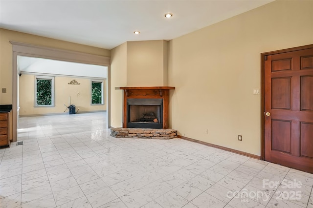 unfurnished living room with a fireplace